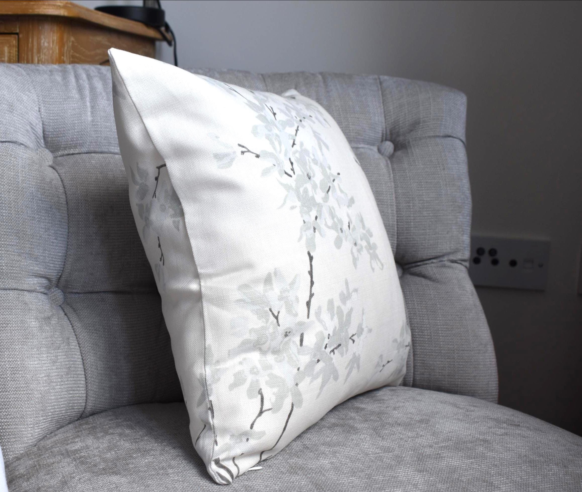Laura Ashley Floral Cushion, Forsythia Natural on both sides with a zip fastening.