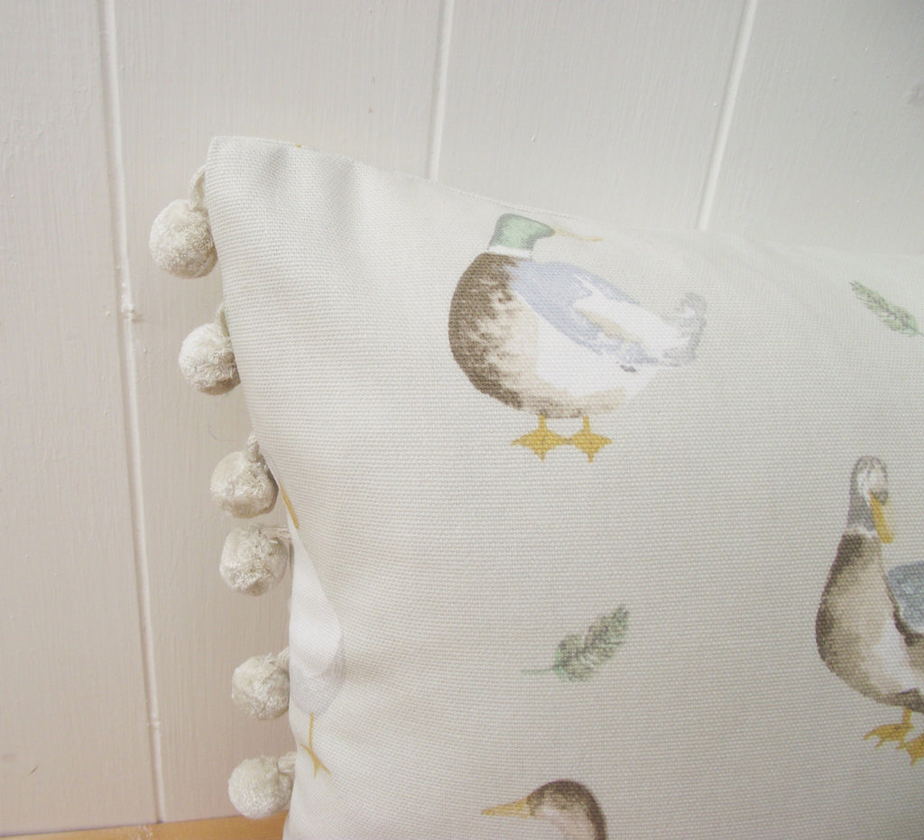 Jenny Duck Cushion with Pom Poms, Ducks Pattern on both side with a zip fastening.
