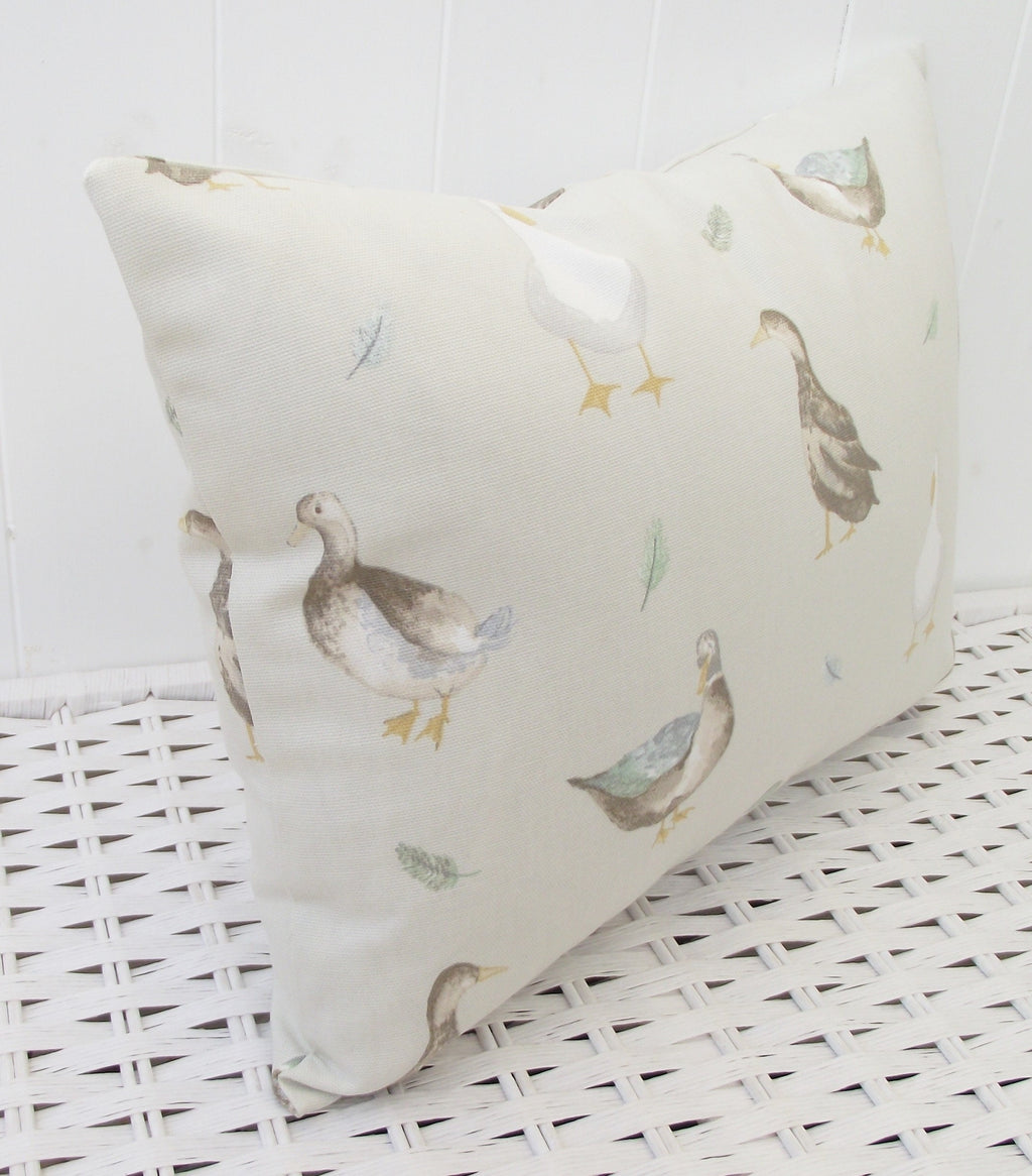 Jenny Duck Cushion with Pom Poms, Ducks Pattern on both side with a zip fastening.
